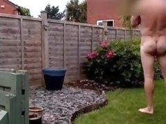 Naked in garden flashing neighbour