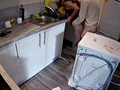 Wife seduces a plumber in the kitchen while husband at work