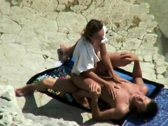 Amateur lovers caught having wild sex at the beach