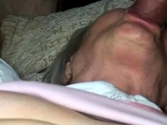 Slutty granny with big tits struggles with a huge black dick