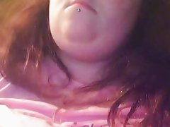 Cute fatty shows big tits on cam